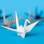 Paper Cranes on Blue
