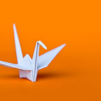 Paper Crane on Orange
